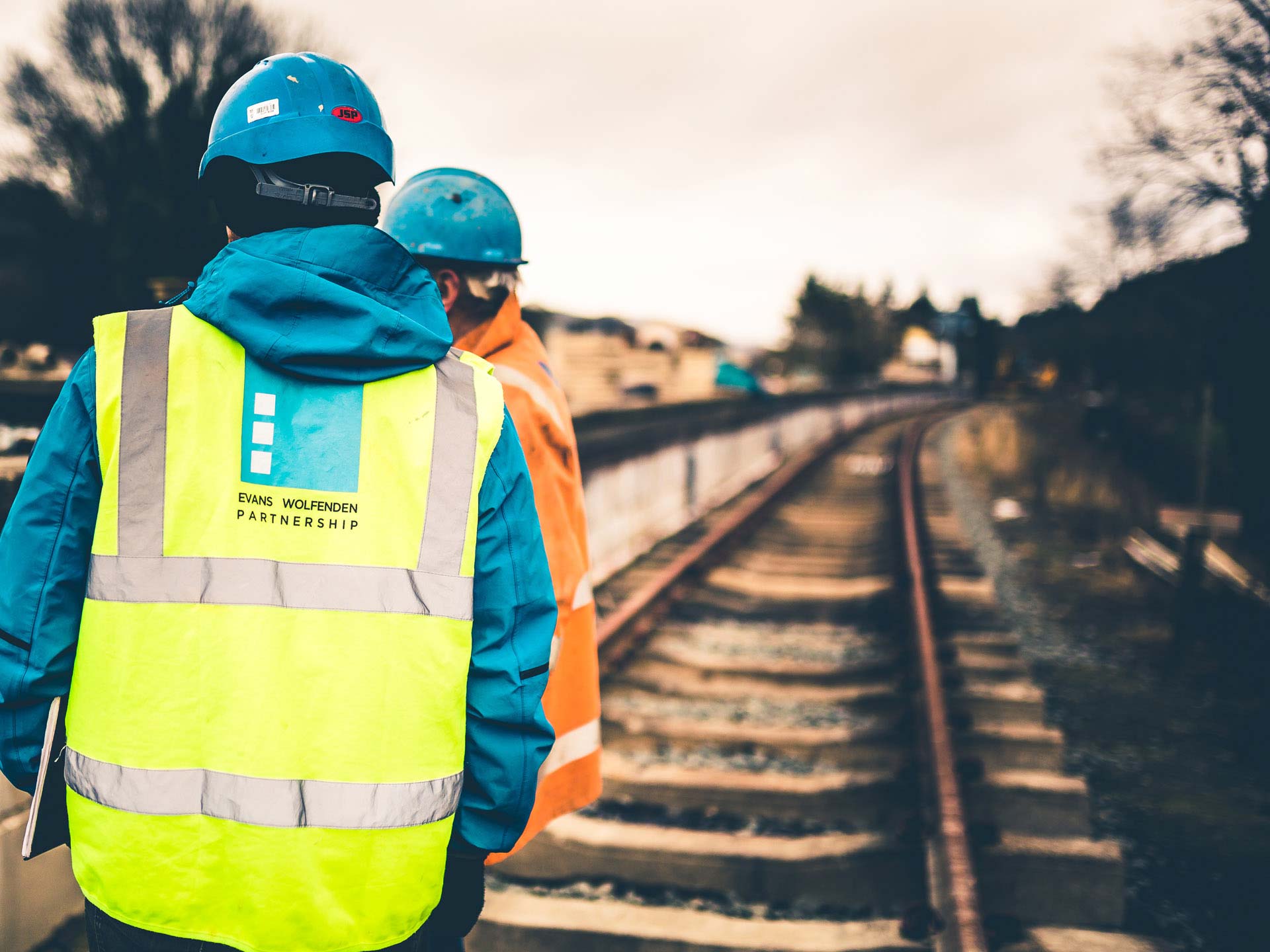 Engineers wearing construction gear at Llangollen Railway project