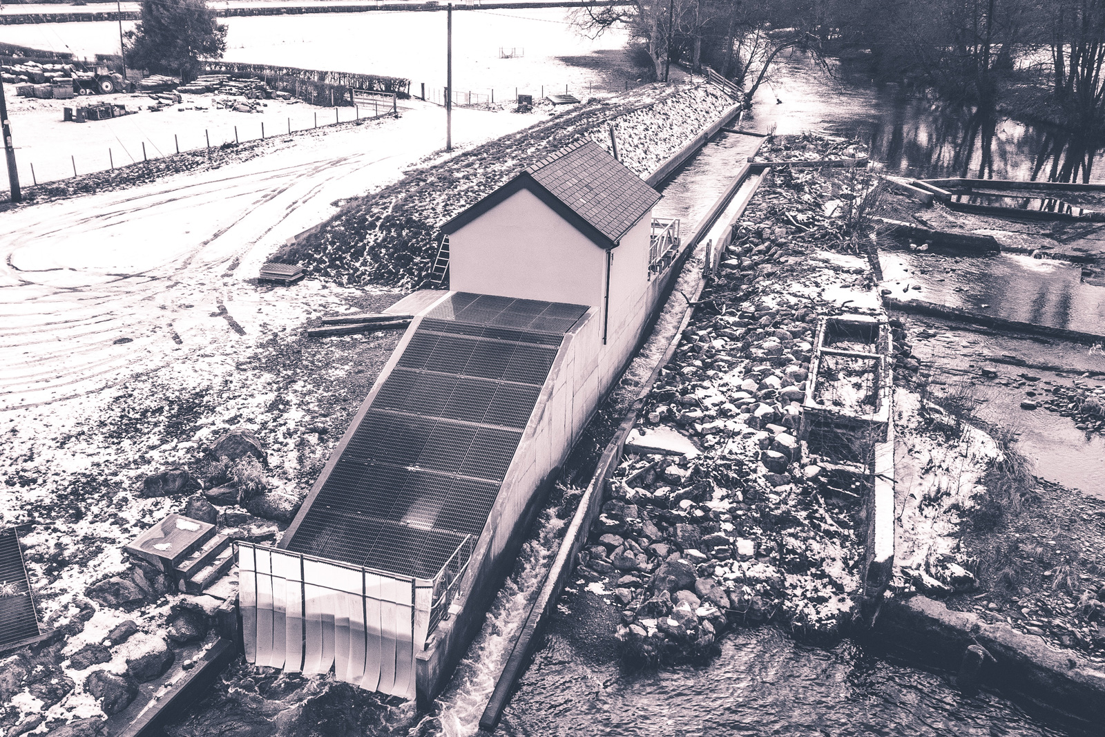 Greyscale image of the hydro scheme, whose construction was taken on by EW Partnership Limited.